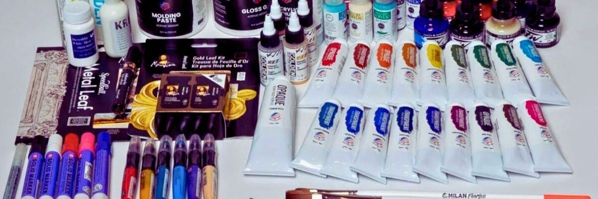 table full of colorful art supplies Milan Art